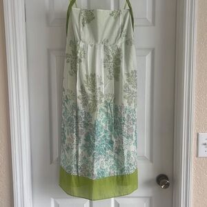Strapless mint green dress with flowers.